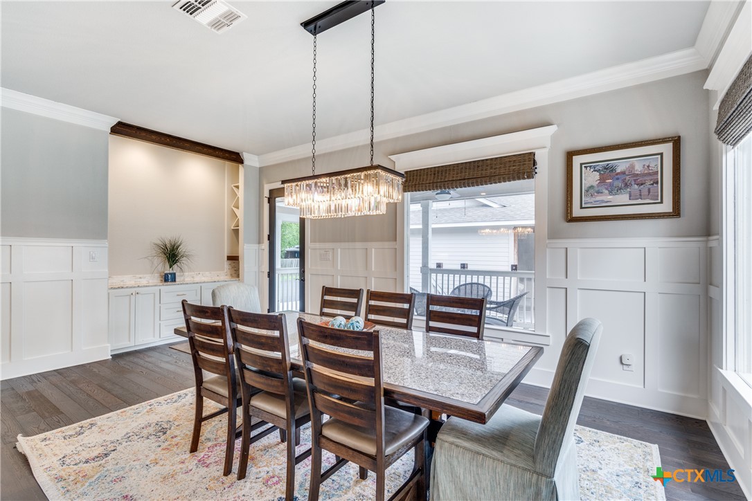 911 Farm Street Bastrop, TX 78602 - Photo 6 of 40 a view of a dining room with furniture