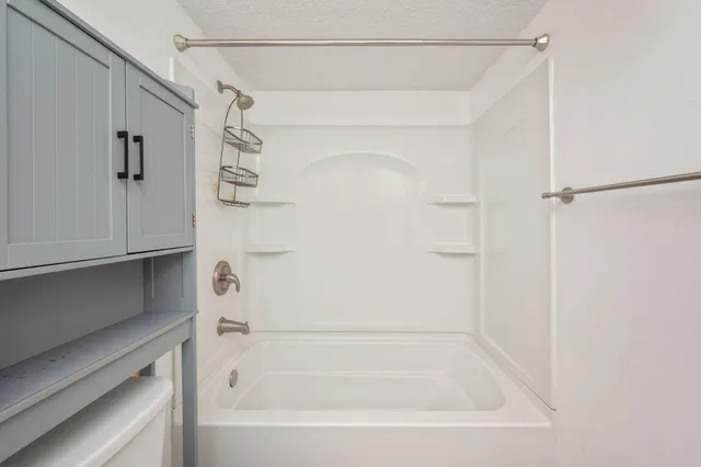 a bathroom with a bathtub