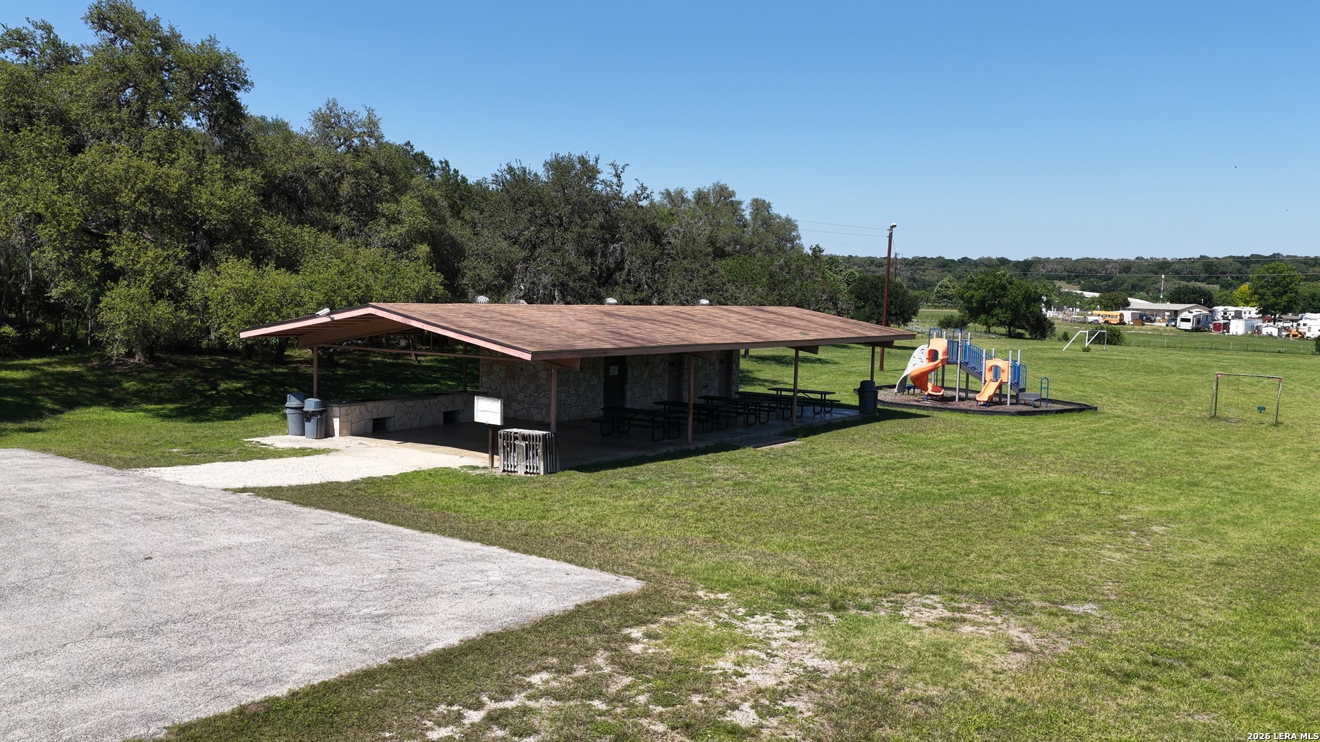 682 Winding River Lane Spring Branch, TX 78070 - Photo 11 of 21 a view of a house with a yard