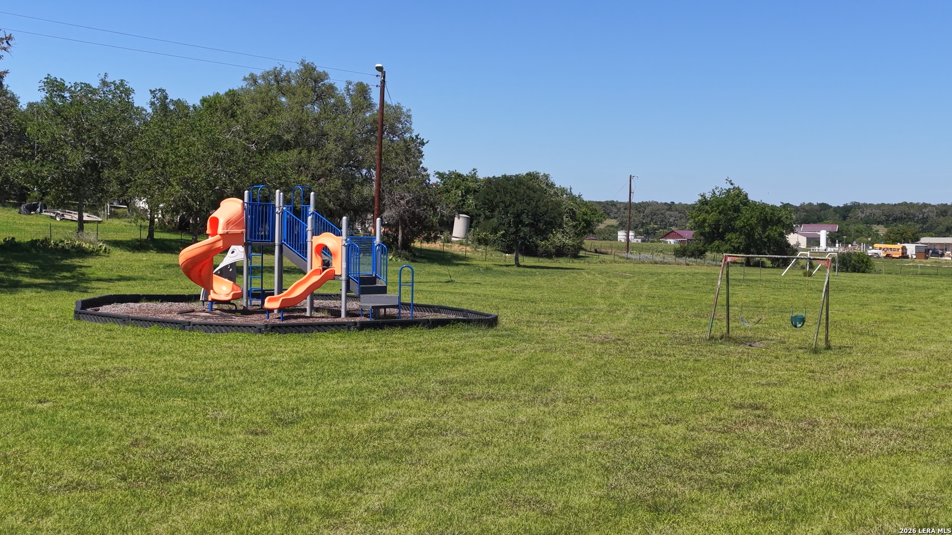 682 Winding River Lane Spring Branch, TX 78070 - Photo 12 of 21 a view of a park with swings