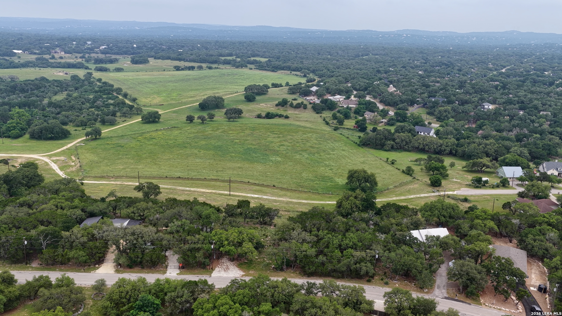 682 Winding River Lane Spring Branch, TX 78070 - Photo 2 of 21 a view of a lake with a city