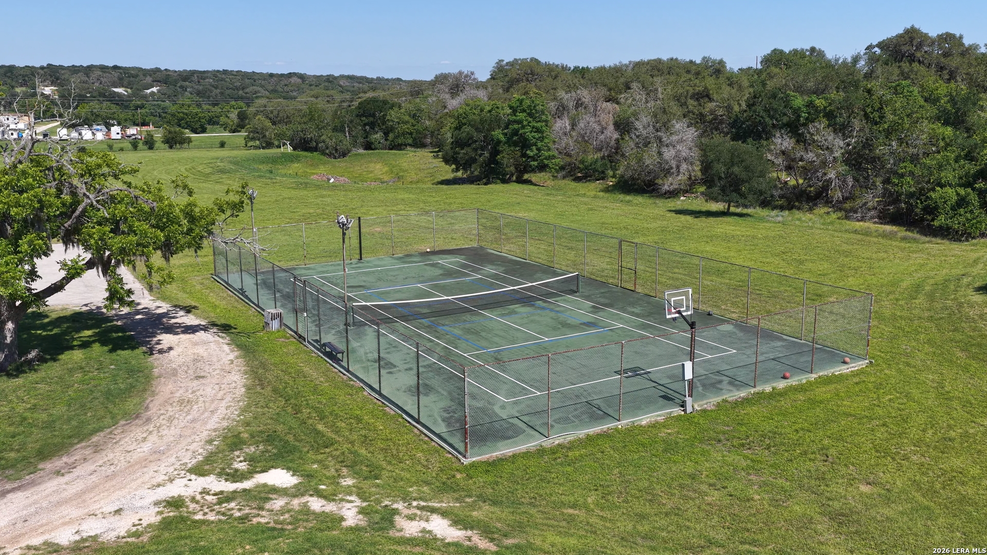 682 Winding River Lane Spring Branch, TX 78070 - Photo 10 of 21 a view of a tennis court