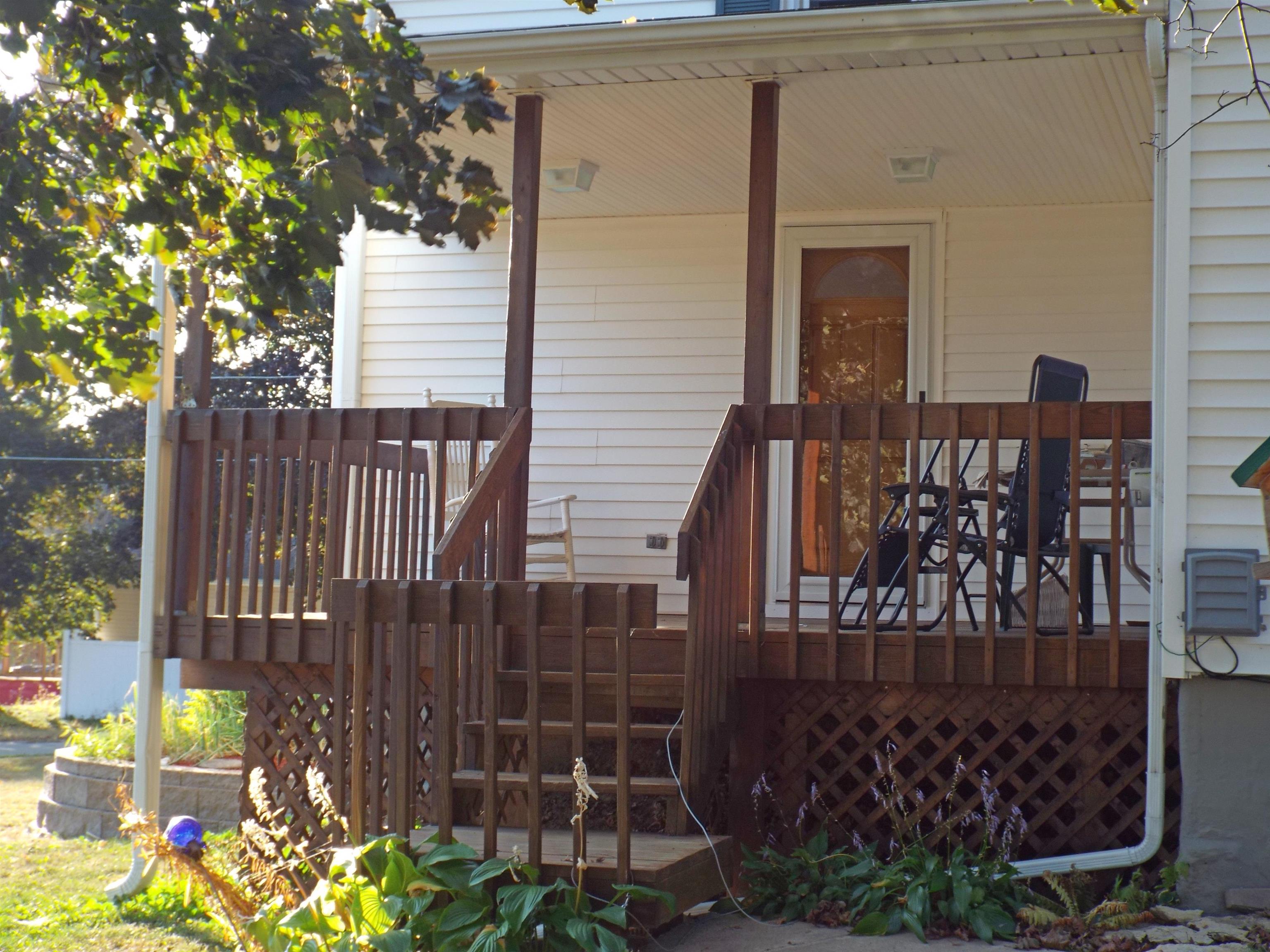 216 South Long Street Warren, IL 61087 - Photo 18 of 19 a view of entryway with a flower garden