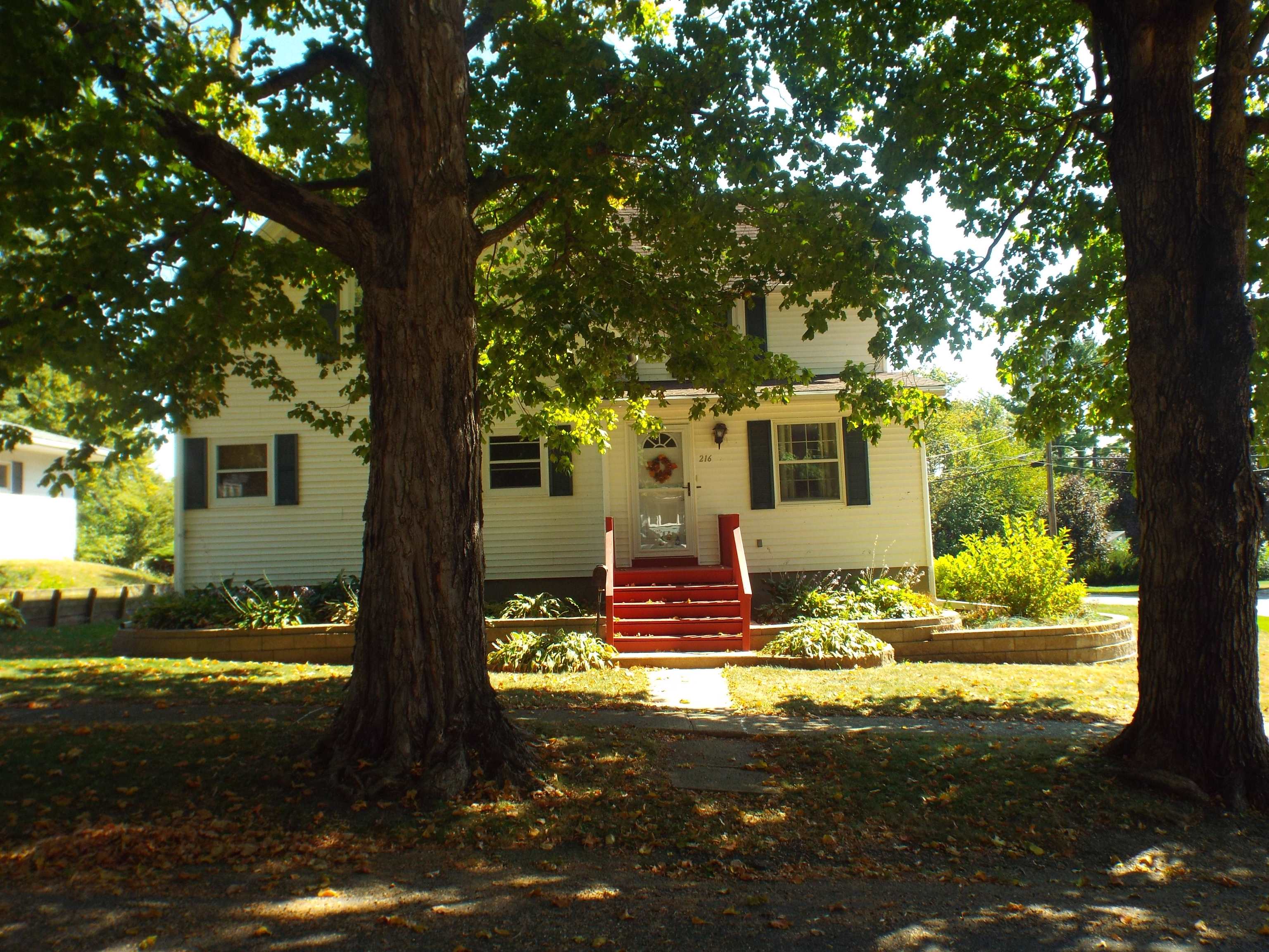 216 South Long Street Warren, IL 61087 - Photo 2 of 19 a view of the house with backyard of the house