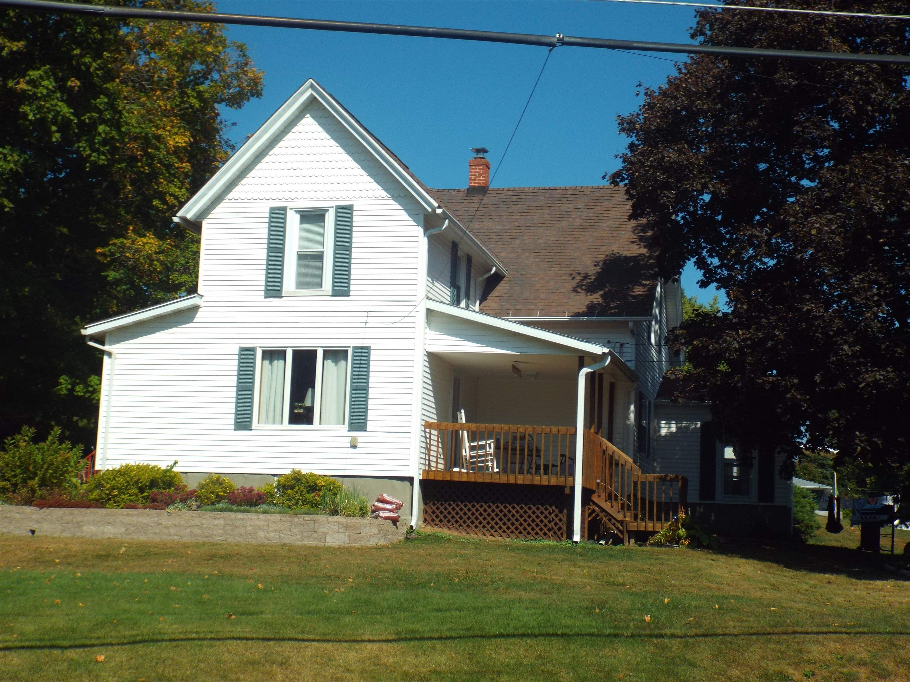 216 South Long Street Warren, IL 61087 - Photo 3 of 19 a view of a house with a yard