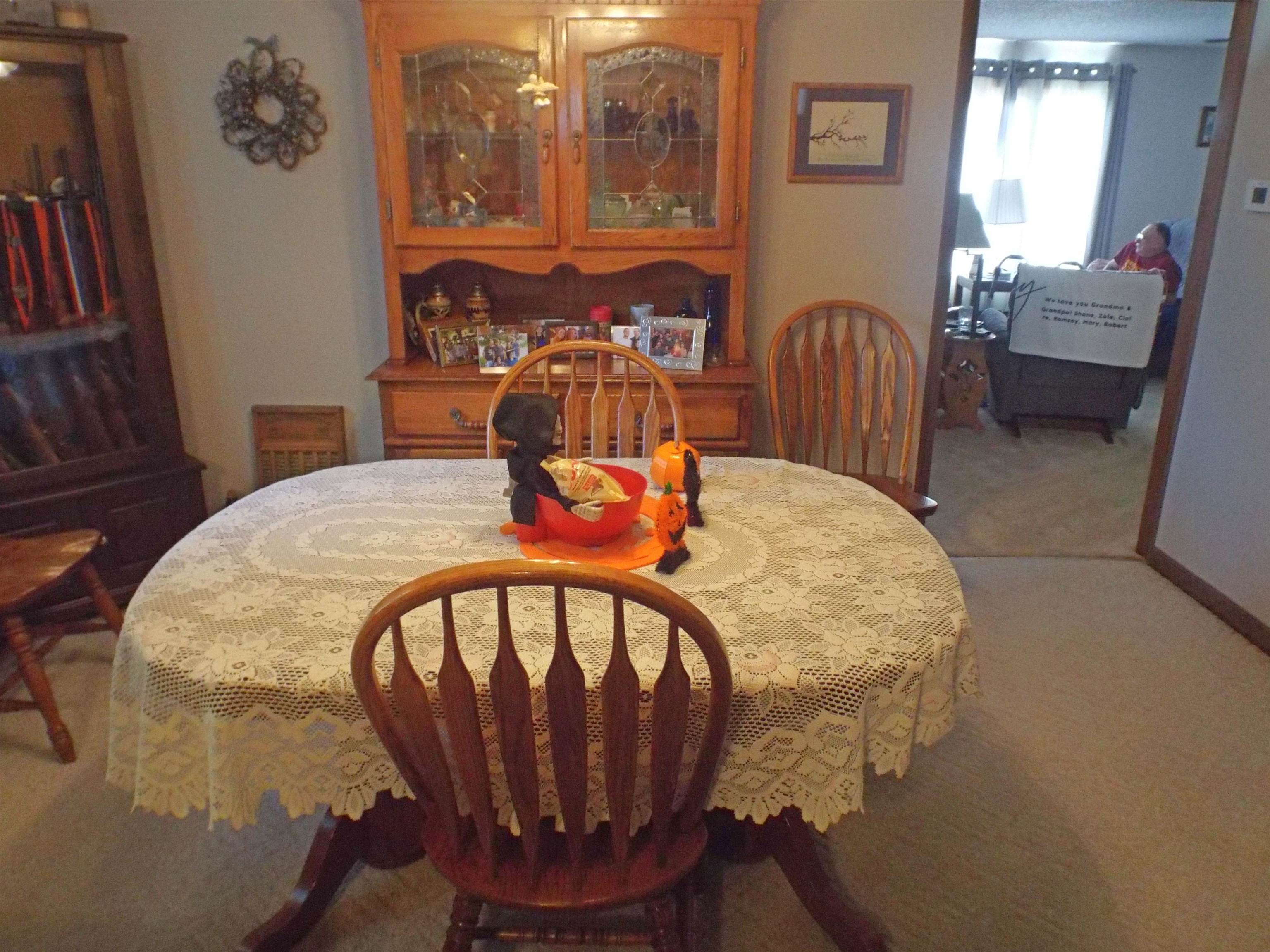 216 South Long Street Warren, IL 61087 - Photo 7 of 19 a view of a dining room with furniture