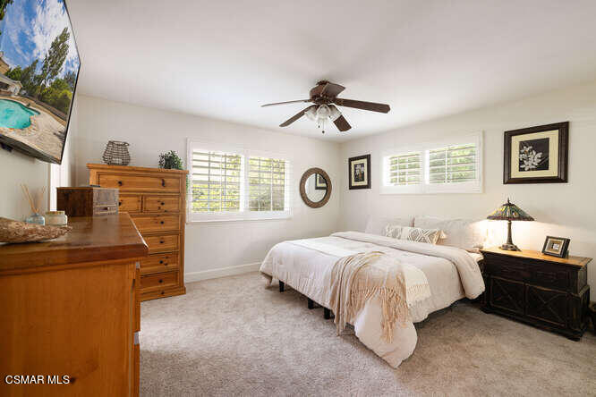 5609 Parkmor Road Calabasas, CA 91302 - Photo 13 of 37 a bedroom with bed and window