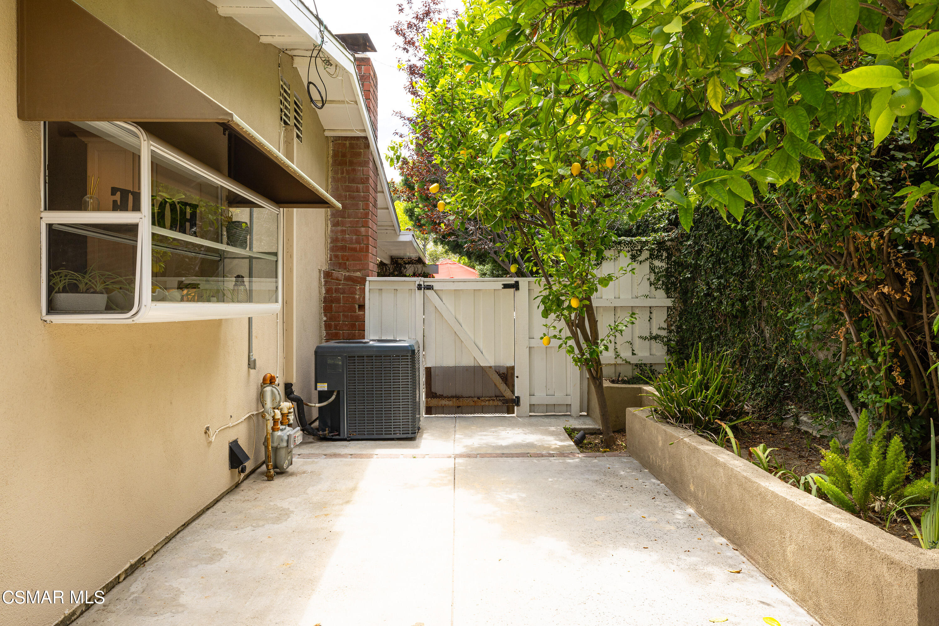 5609 Parkmor Road Calabasas, CA 91302 - Photo 36 of 37 a view of a house with a tree in the background