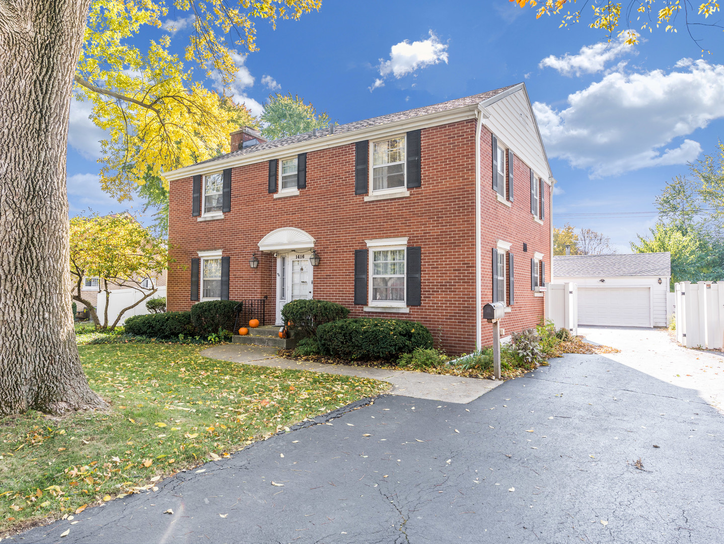 1416 West Acres Road Joliet, IL 60435 - Photo 2 of 30 a front view of a house with garden