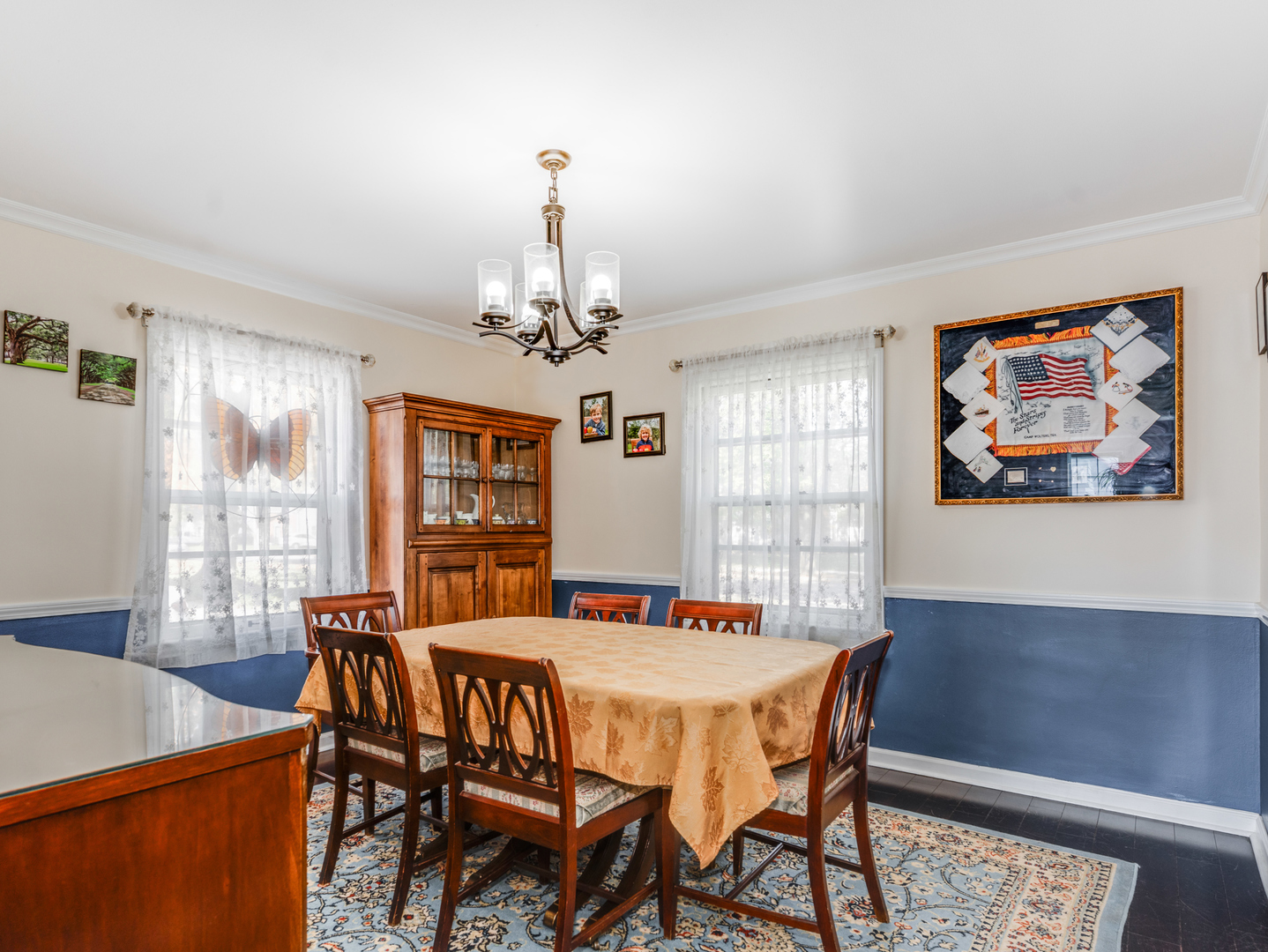 1416 West Acres Road Joliet, IL 60435 - Photo 10 of 30 a view of a dining room with furniture window and wooden floor