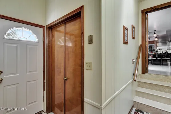 a bathroom with a sink toilet and mirror