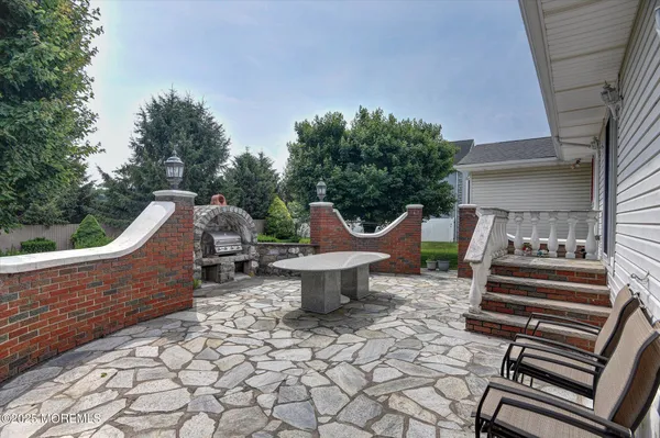 a bedroom with a bed and flat screen tv