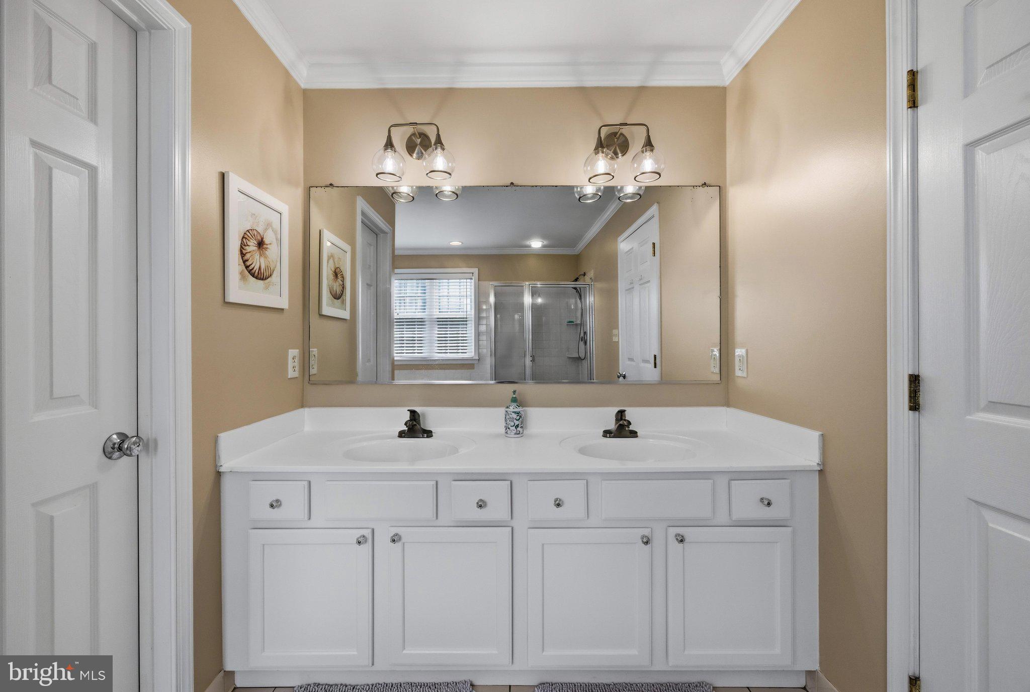 233 Circle Road Pasadena, MD 21122 - Photo 29 of 59 Primary bath with double vanity.