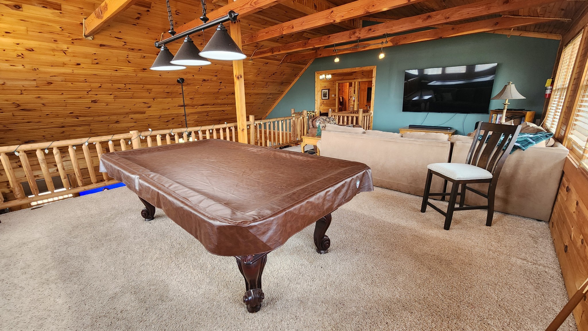 5615 Eastport Road Alpine, TN 38543 - Photo 39 of 83 a living room with furniture and a flat screen tv