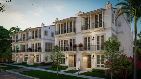 a front view of a building with garden