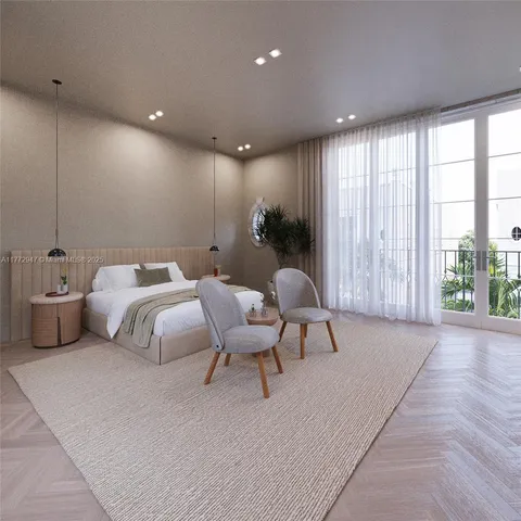 a spacious bedroom with a bed and large windows