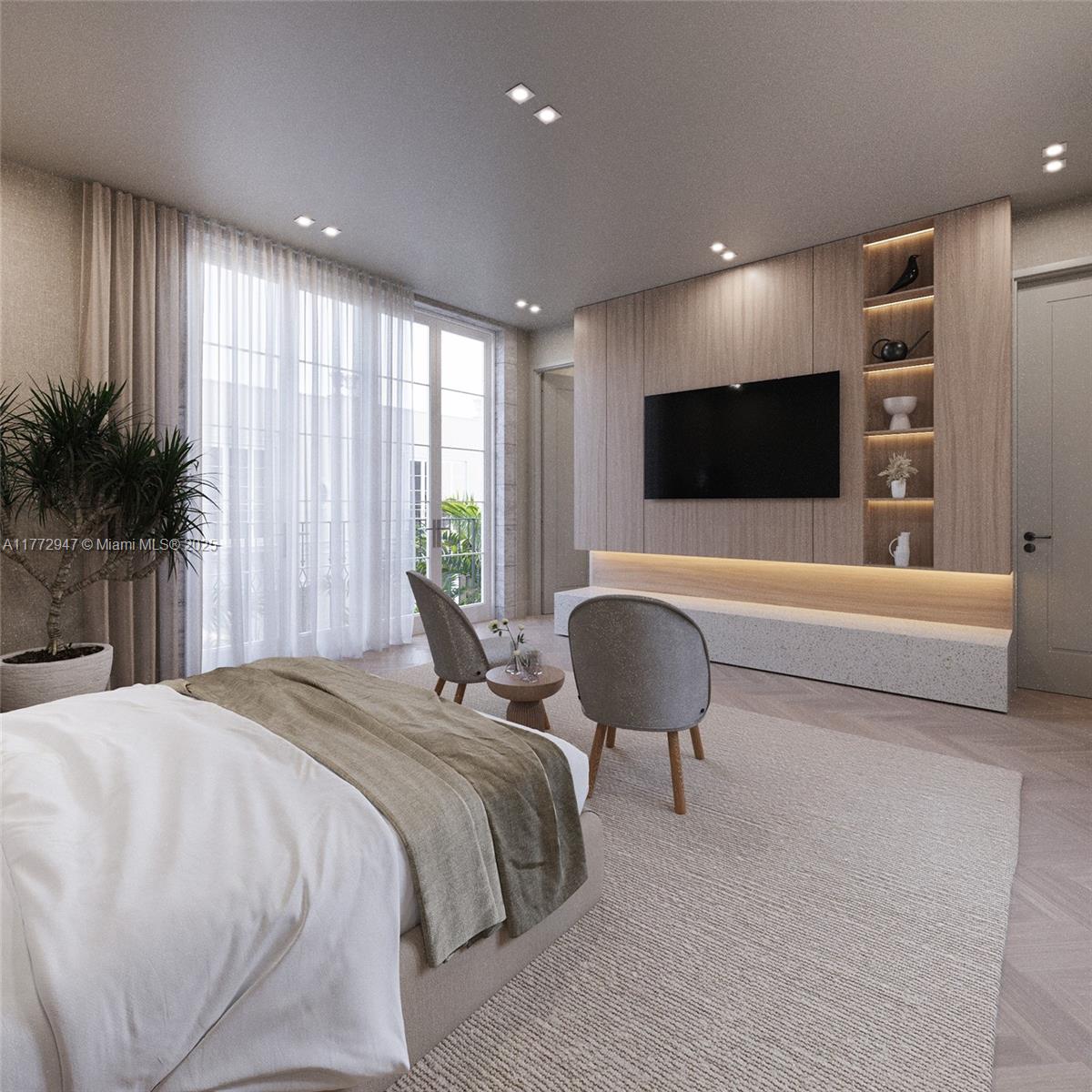 915 Palermo Avenue, Unit 1 Coral Gables, FL 33134 - Photo 25 of 35 a spacious bedroom with a bed and a chair