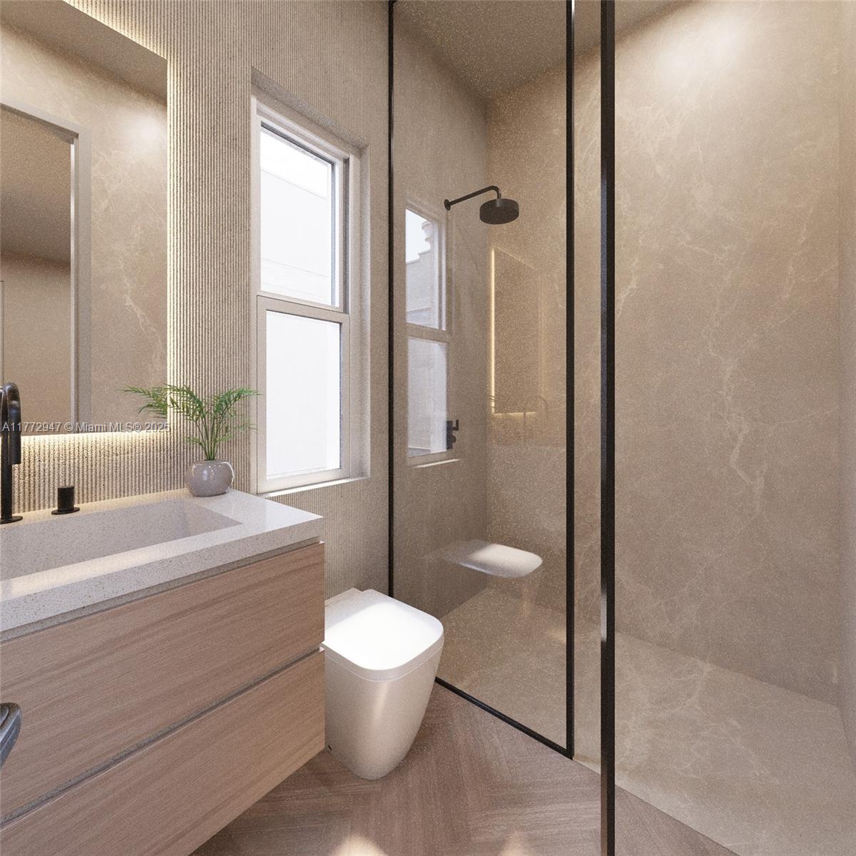 915 Palermo Avenue, Unit 1 Coral Gables, FL 33134 - Photo 27 of 35 a bathroom with a white toilet sitting next to a window