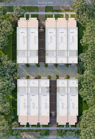 a aerial view of a multi story building with yard and large trees