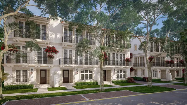 a view of a building with a yard