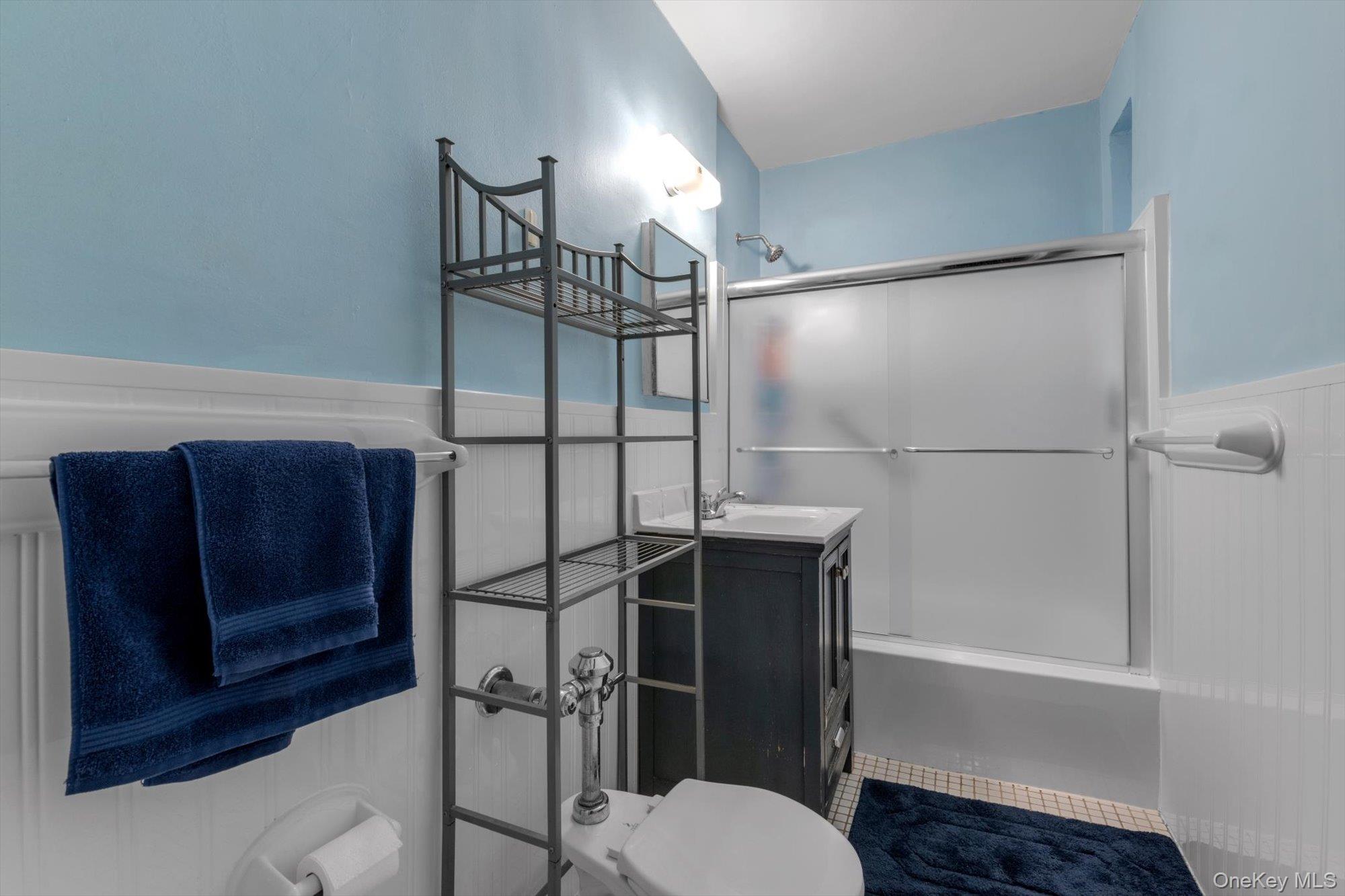 123-35 82nd Road, Unit 5C Queens, NY 11415 - Photo 14 of 21 a bathroom with a toilet and a shower