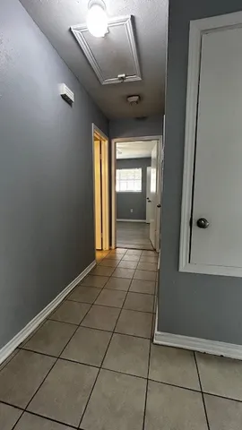 a view of an empty room and window