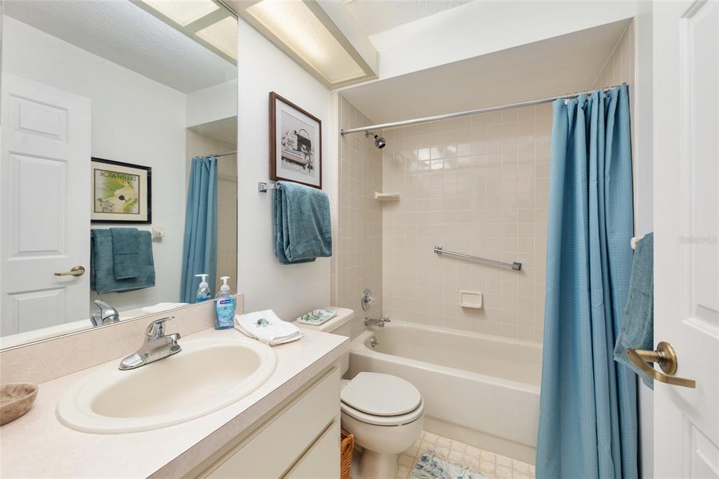 8038 Southwest 108th Loop Ocala, FL 34481 - Photo 28 of 48 a bathroom with a sink toilet and shower