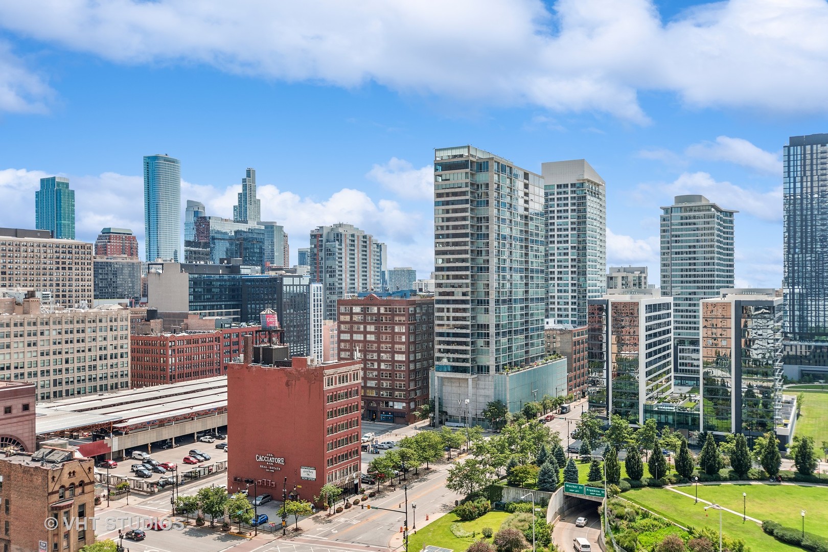 235 West Van Buren Street, Unit 1809 Chicago, IL 60607 - Photo 13 of 13 a view of a city with tall buildings