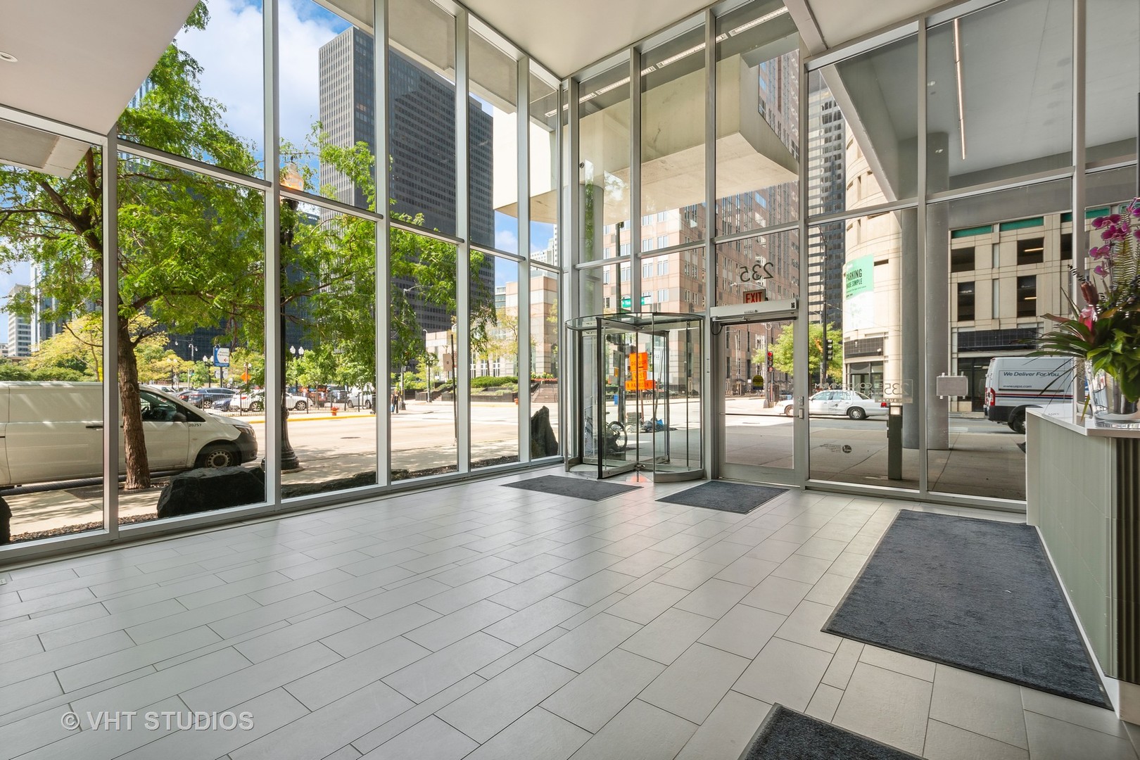235 West Van Buren Street, Unit 1809 Chicago, IL 60607 - Photo 3 of 13 a view of an empty room with windows