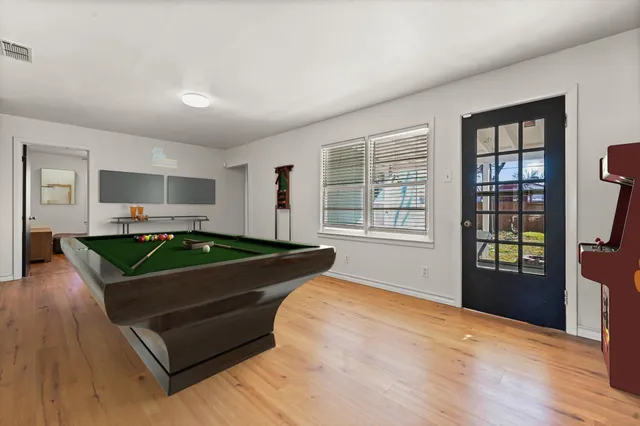 a living room with a couch and a window