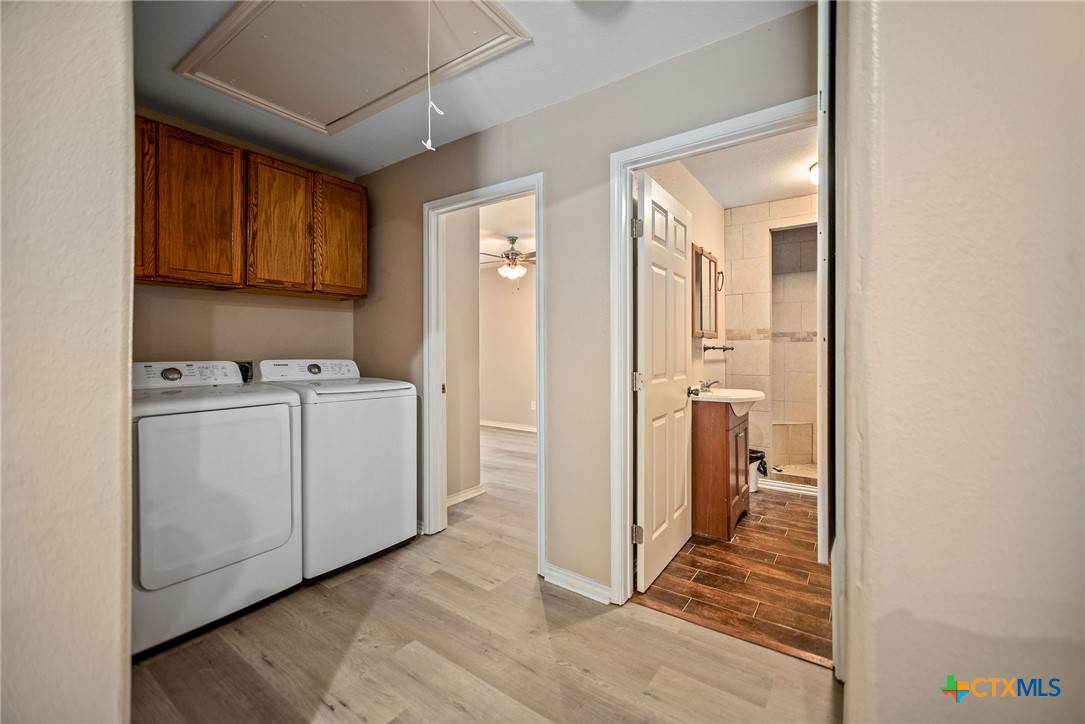 190 Hood Road Inez, TX 77968 - Photo 15 of 36 a view of a storage & utility room with a sink