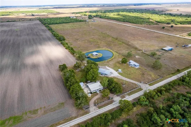 a view of a street with a ocean view