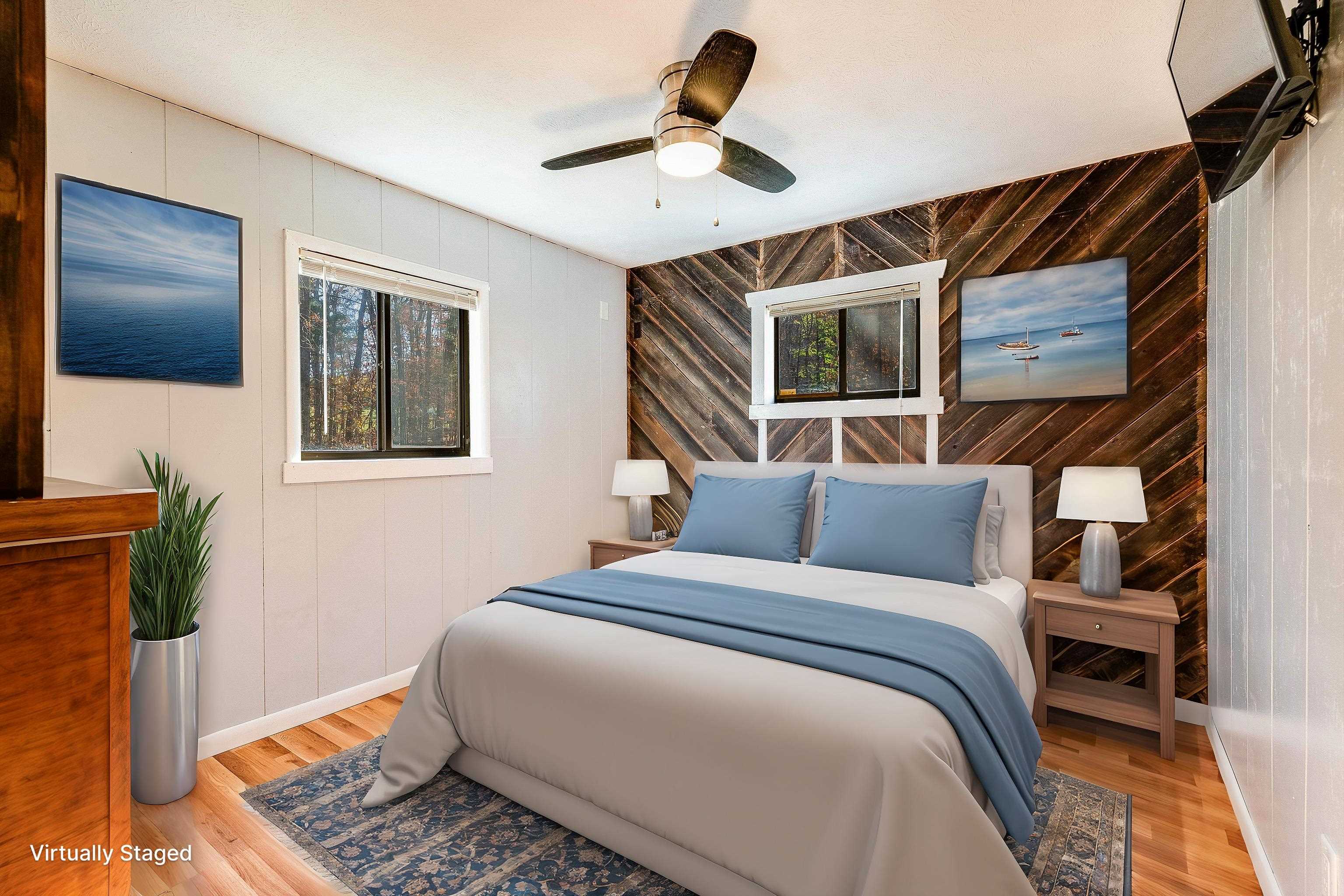 2497 Lacey Spring Road Broadway, VA 22815 - Photo 15 of 45 a bedroom with a large bed and a window