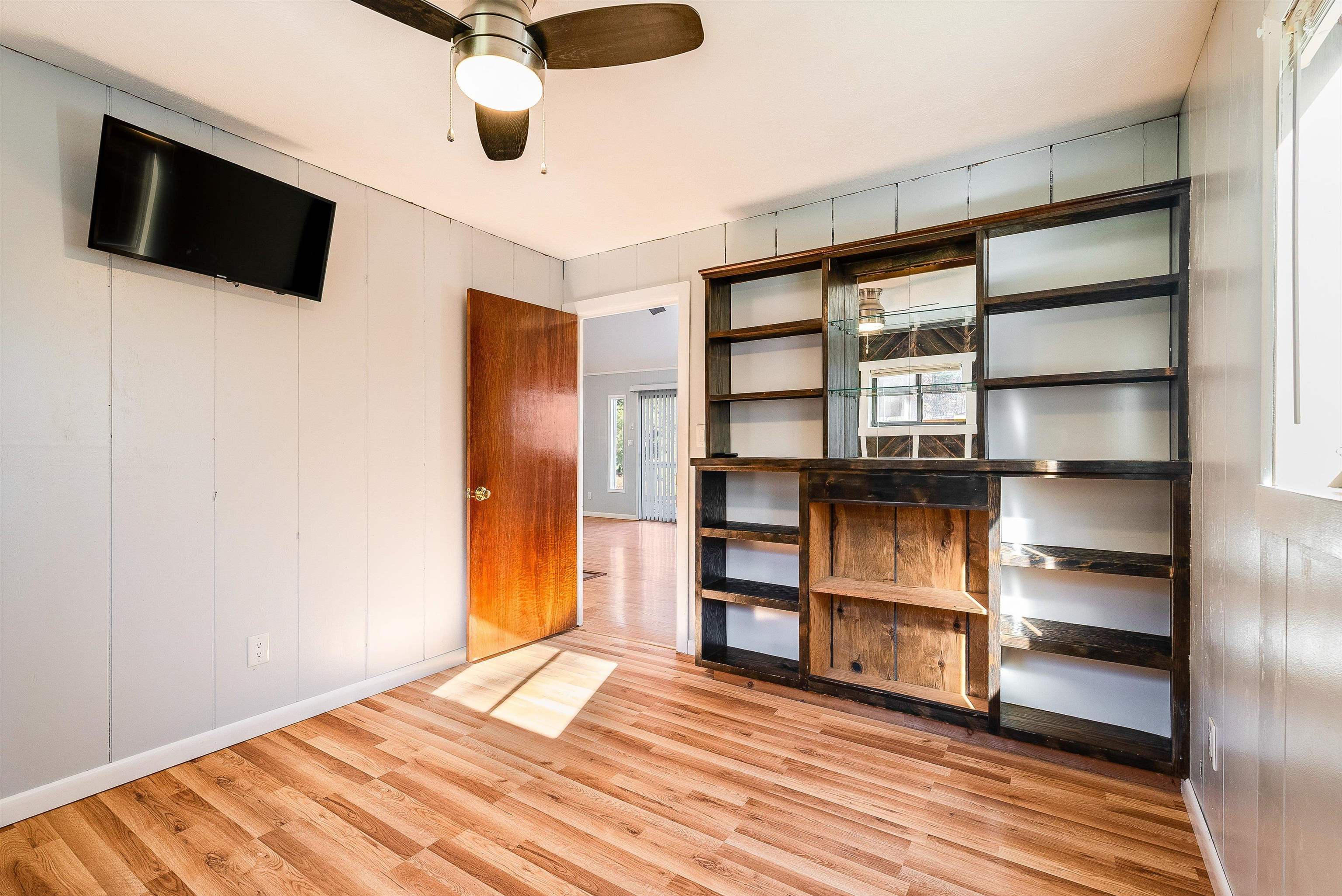 2497 Lacey Spring Road Broadway, VA 22815 - Photo 17 of 45 a view of empty room with wooden floor and window