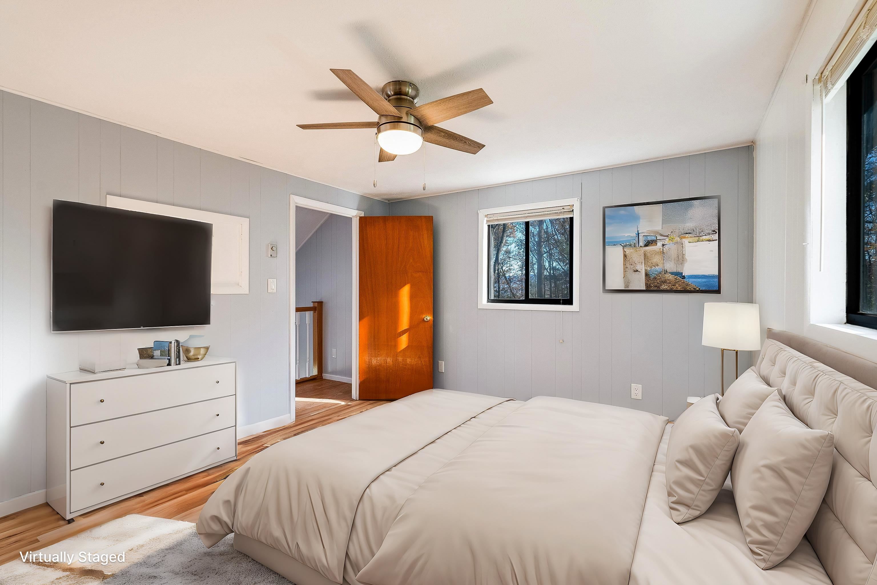 2497 Lacey Spring Road Broadway, VA 22815 - Photo 20 of 45 a bedroom with a bed and a flat screen tv