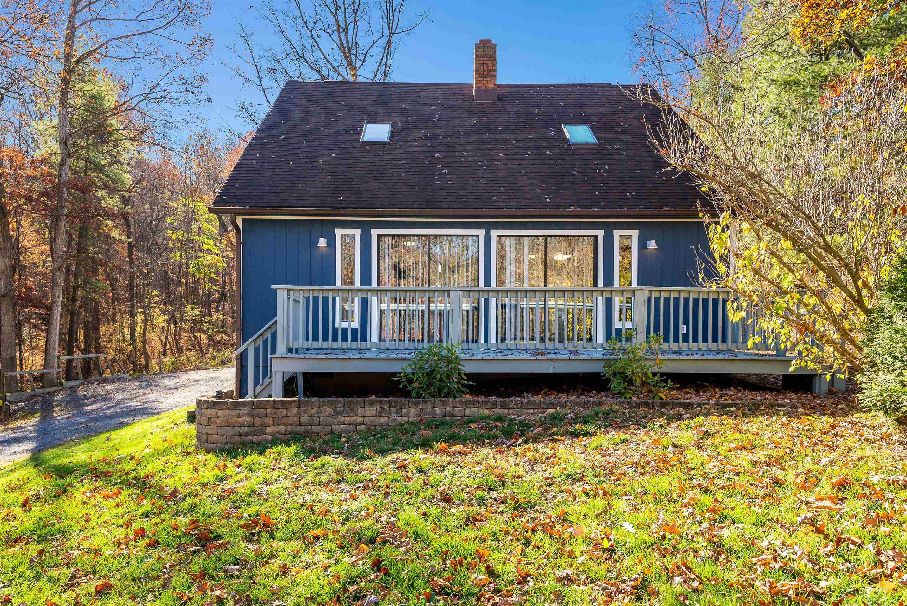 2497 Lacey Spring Road Broadway, VA 22815 - Photo 2 of 45 a front view of a house with a garden
