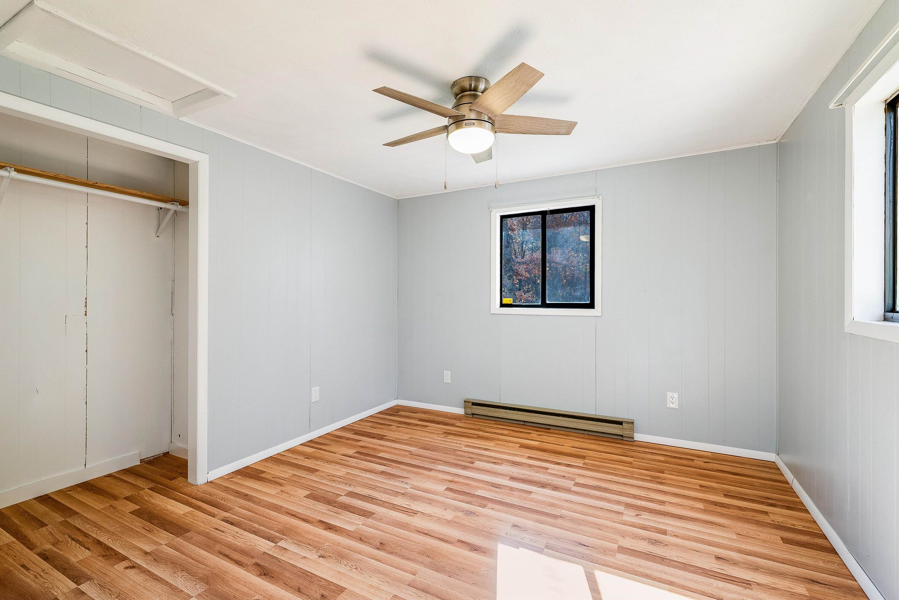 2497 Lacey Spring Road Broadway, VA 22815 - Photo 24 of 45 a view of a room with wooden floor and ceiling fan