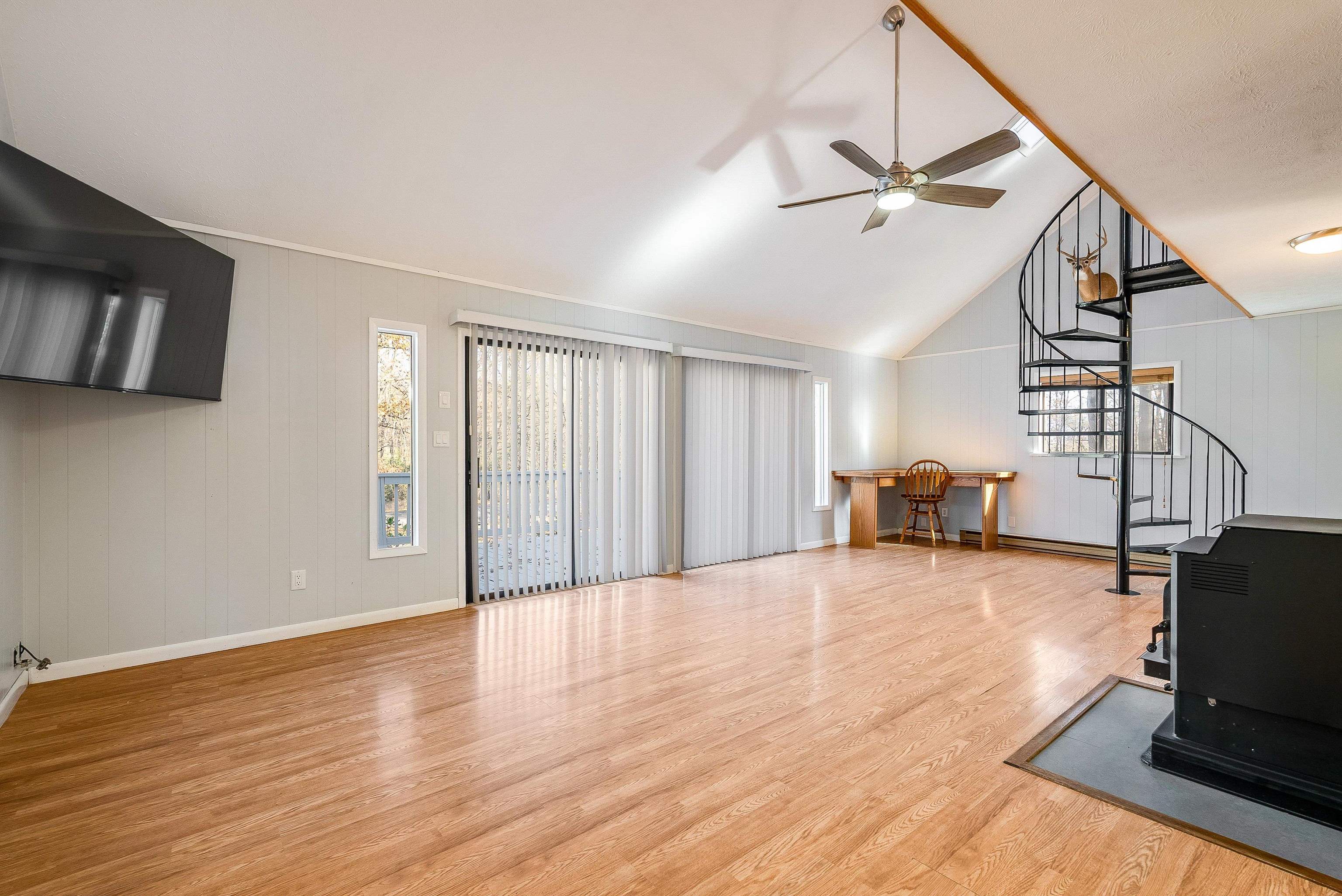 2497 Lacey Spring Road Broadway, VA 22815 - Photo 10 of 45 a view of empty room with wooden floor and fan
