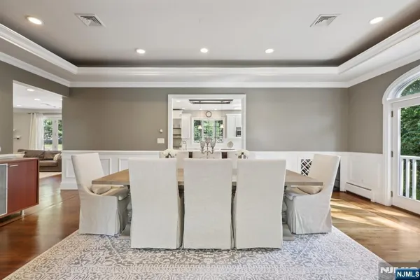 a living room with furniture a window and a table