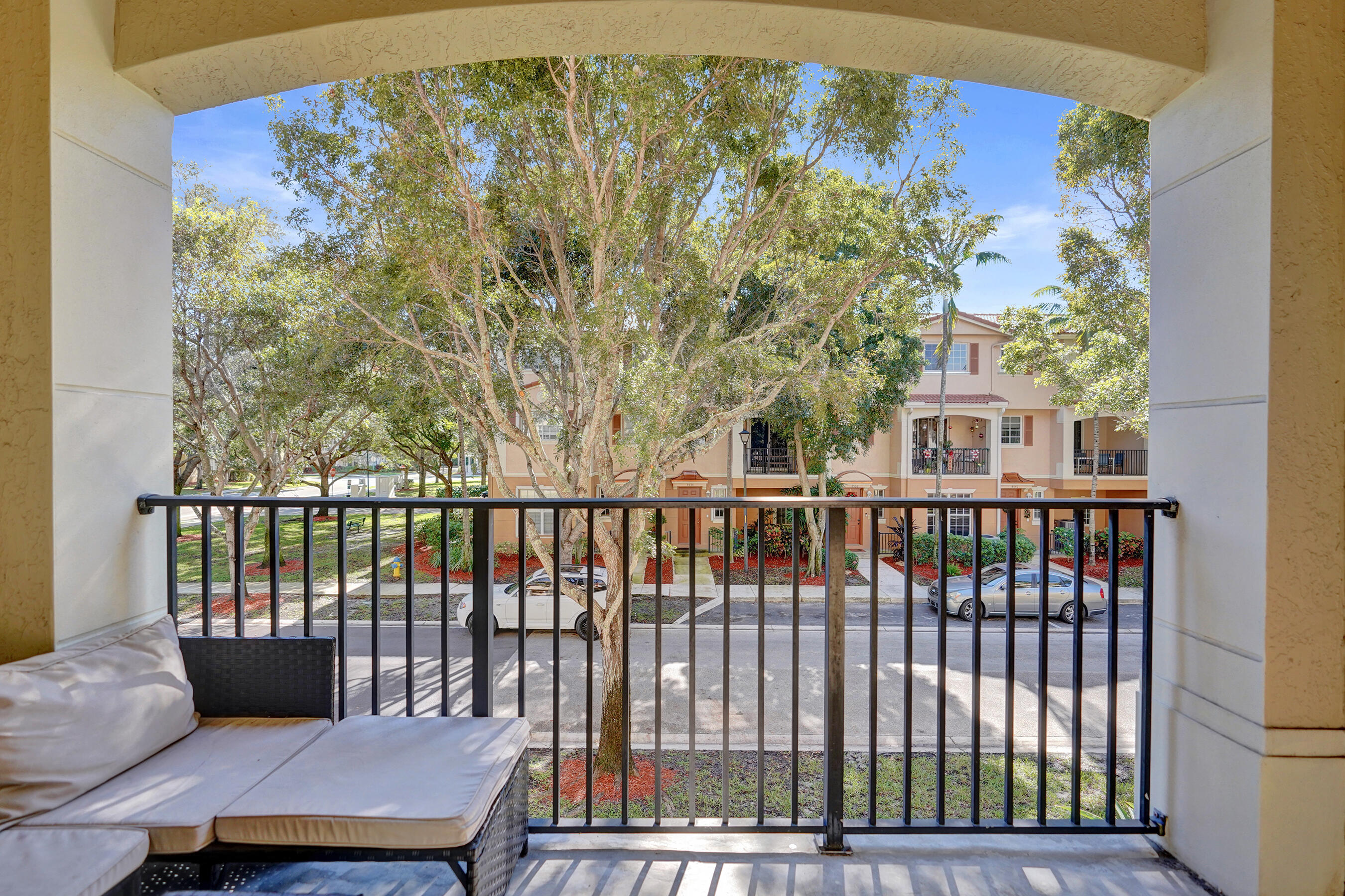 4533 Danson Way Delray Beach, FL 33445 - Photo 3 of 88 a view of a balcony with wooden floor