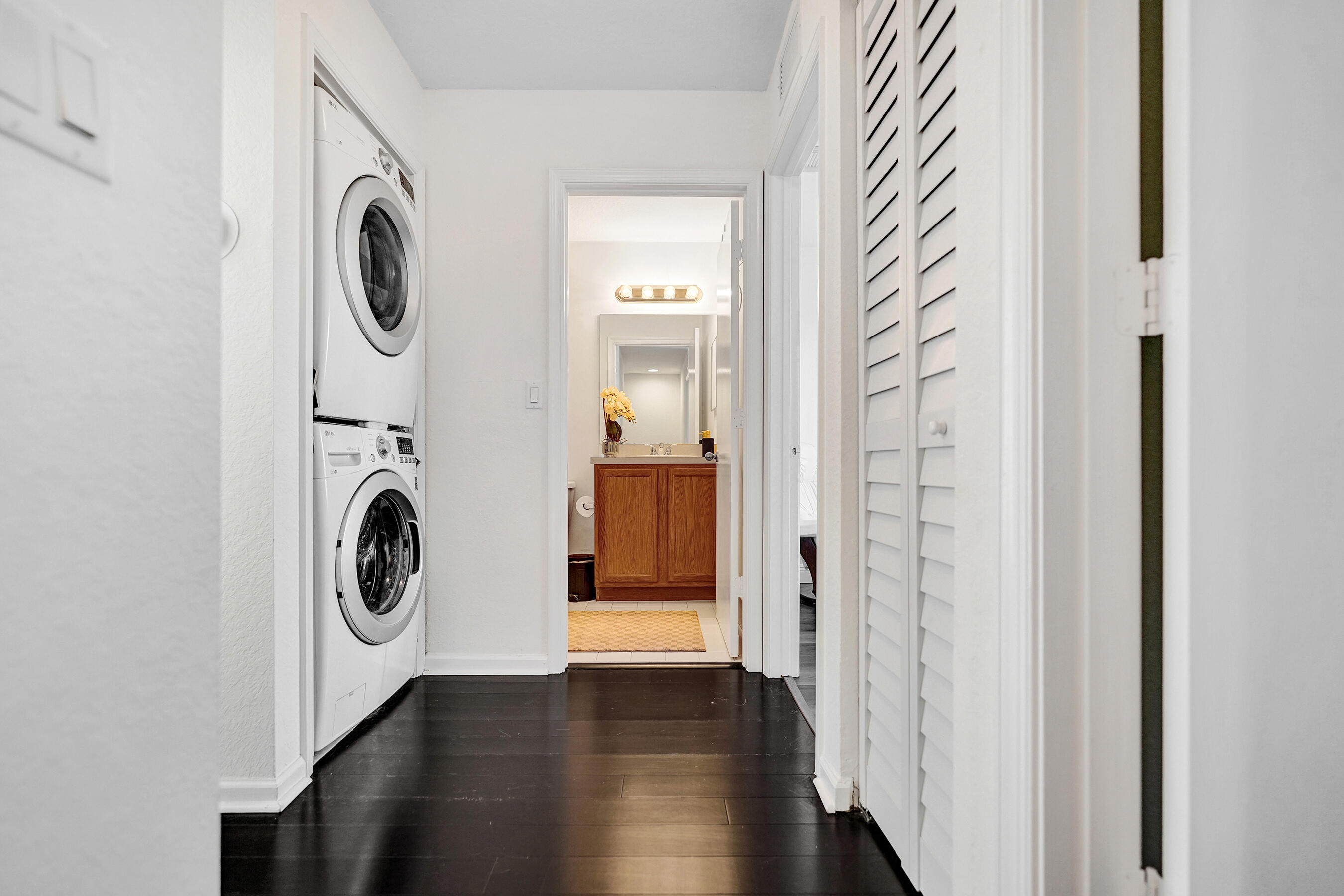 4533 Danson Way Delray Beach, FL 33445 - Photo 49 of 88 a view of a storage and utility room with washer and dryer