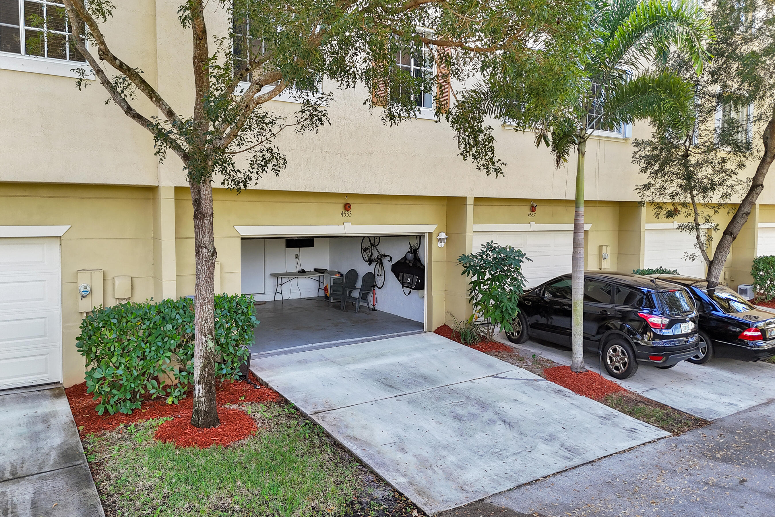4533 Danson Way Delray Beach, FL 33445 - Photo 56 of 88 a view of a car garage