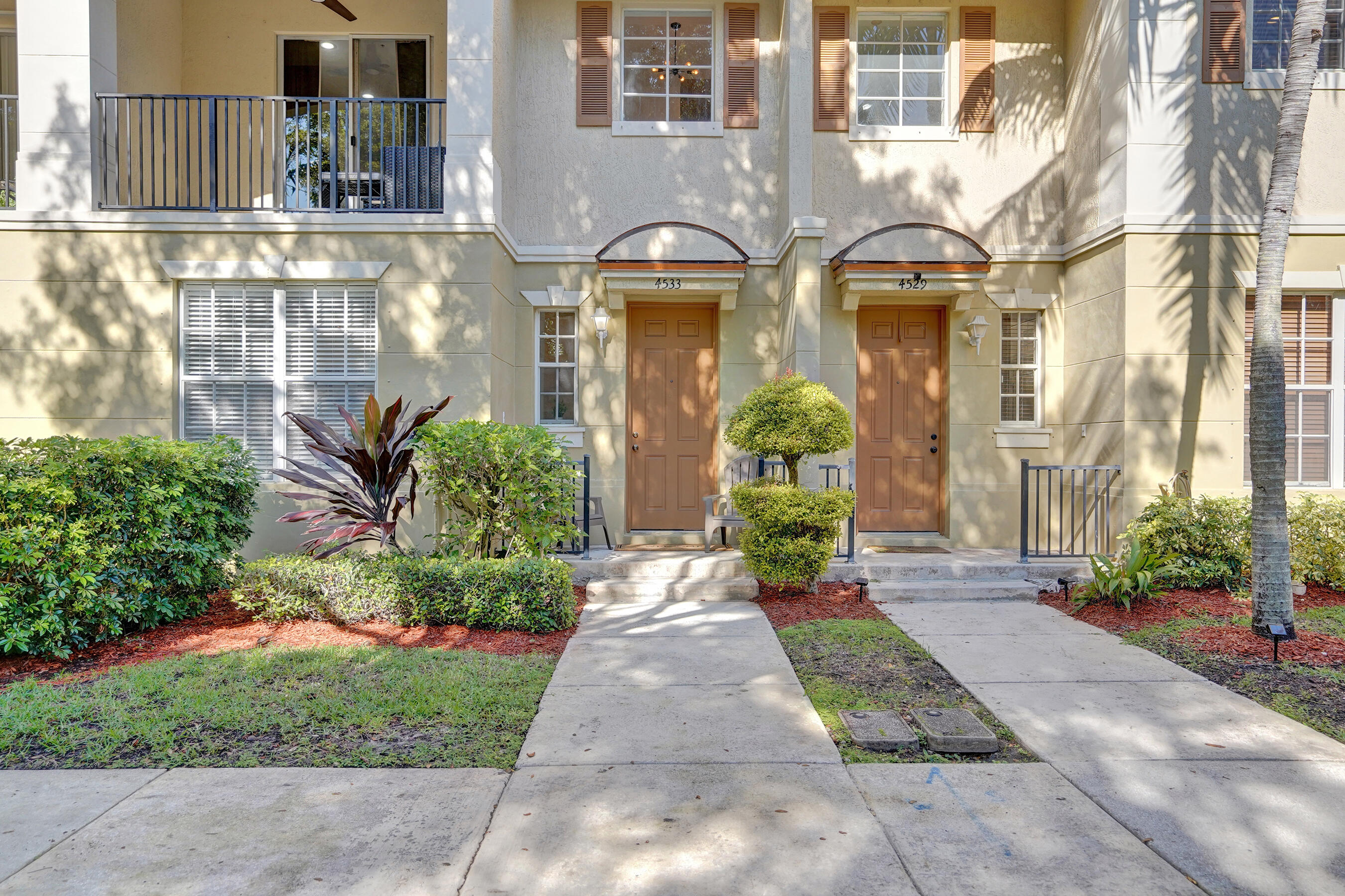 4533 Danson Way Delray Beach, FL 33445 - Photo 60 of 88 a front view of a house