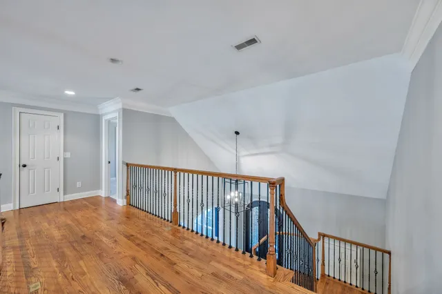 a bathroom with a double vanity sink and mirror
