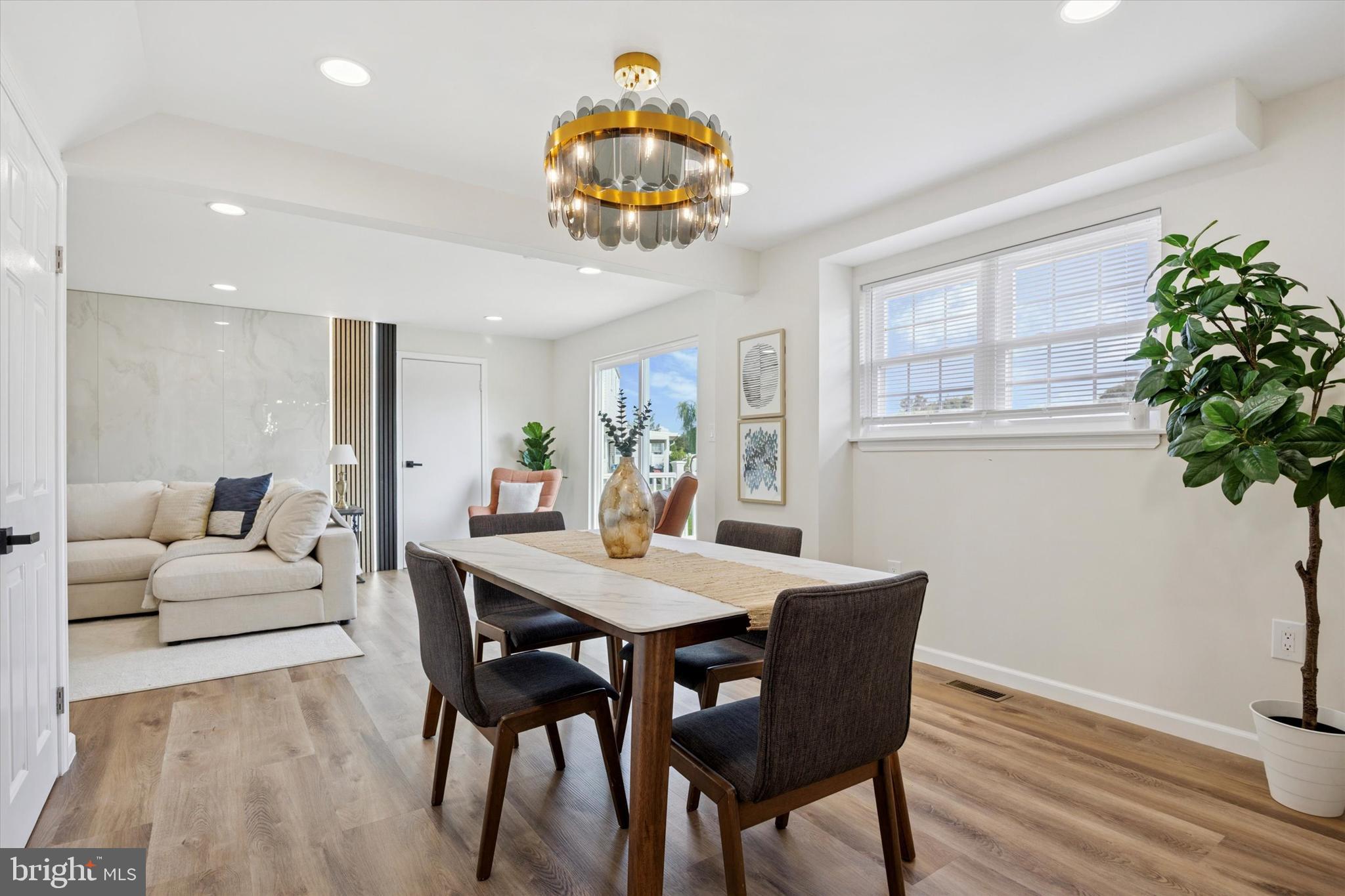 1574 Deer Run Road Warminster, PA 18974 - Photo 14 of 37 a view of a dining room with furniture window and wooden floor