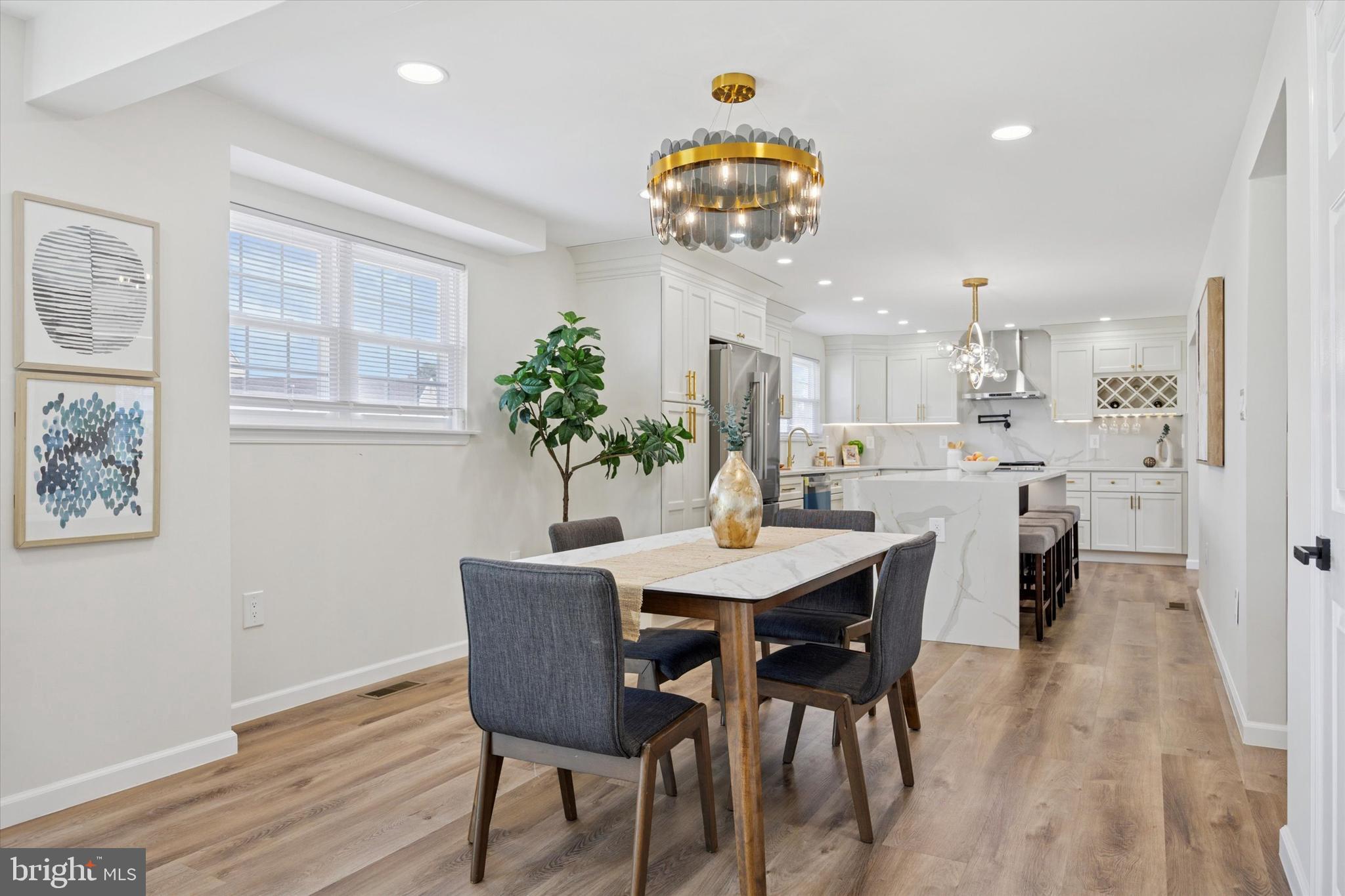 1574 Deer Run Road Warminster, PA 18974 - Photo 15 of 37 a view of a dining room with furniture and wooden floor