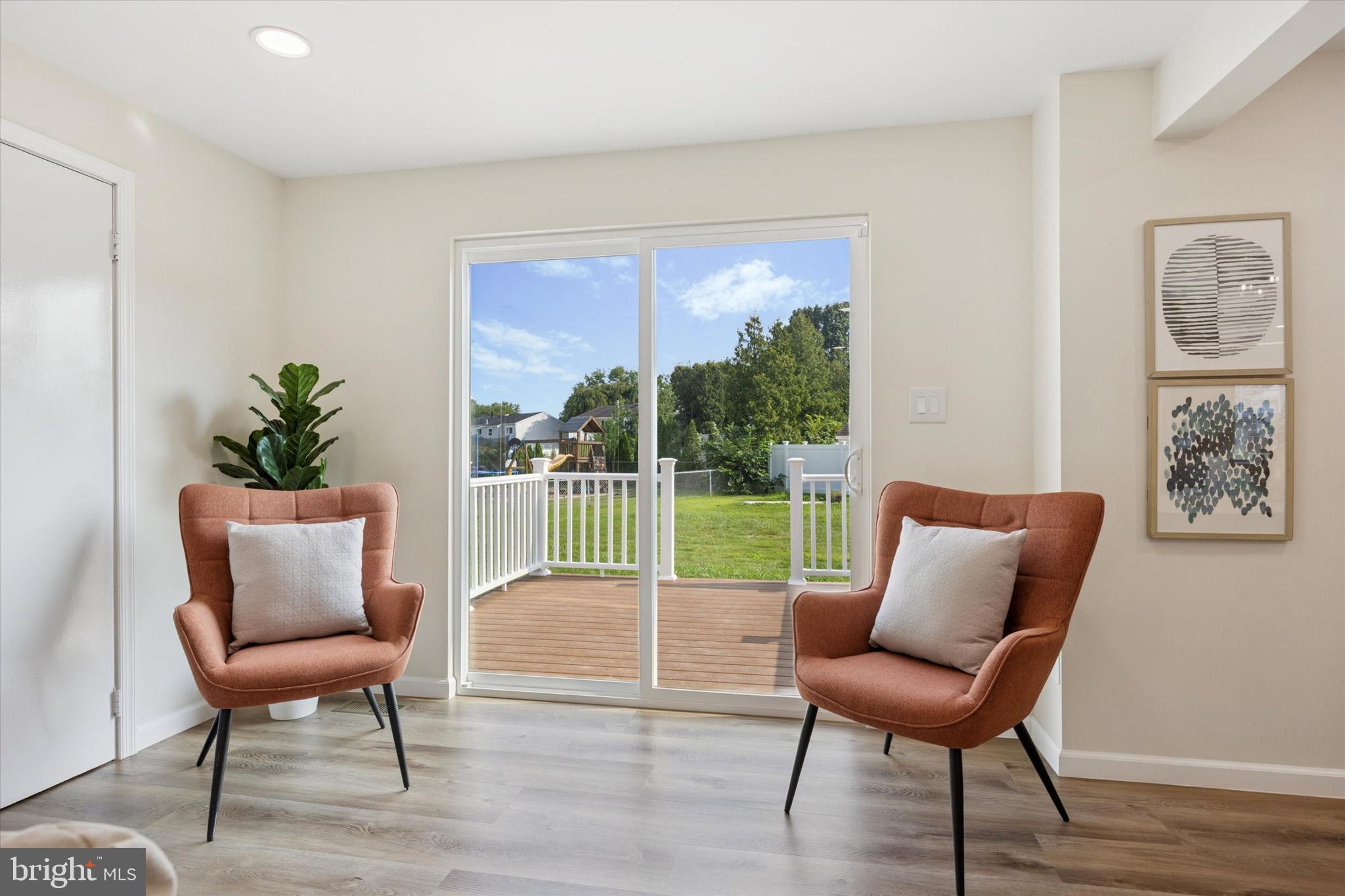 1574 Deer Run Road Warminster, PA 18974 - Photo 20 of 37 a living room with furniture and a wooden floor