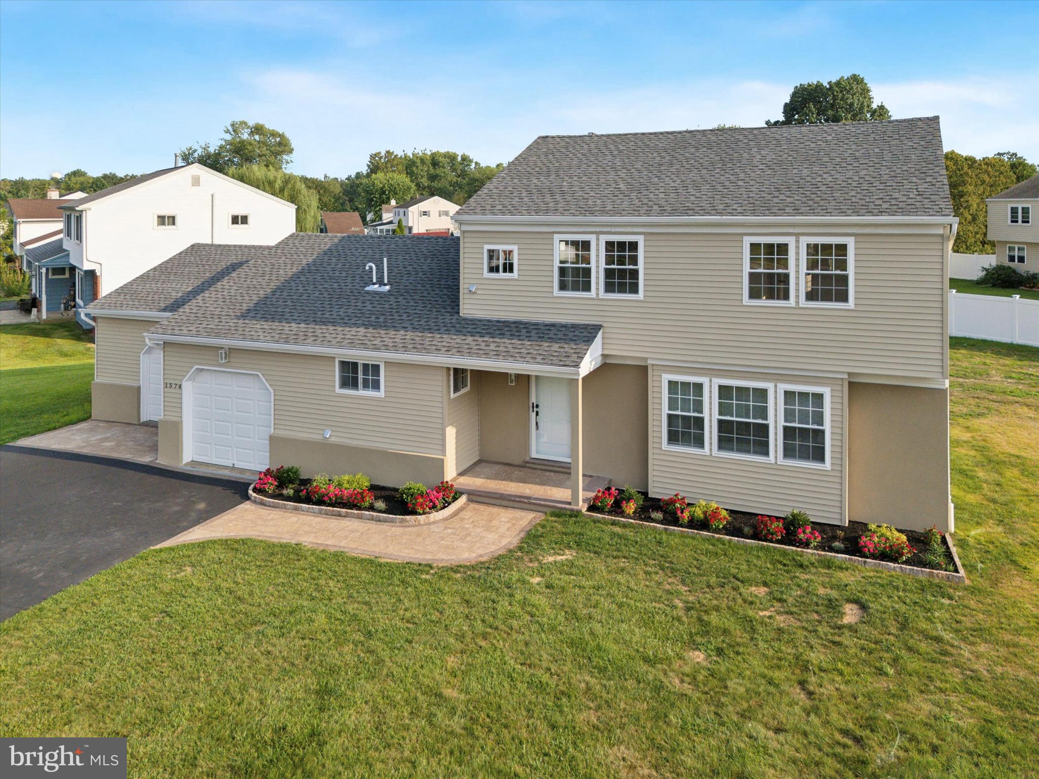 1574 Deer Run Road Warminster, PA 18974 - Photo 2 of 37 a front view of a house with a yard