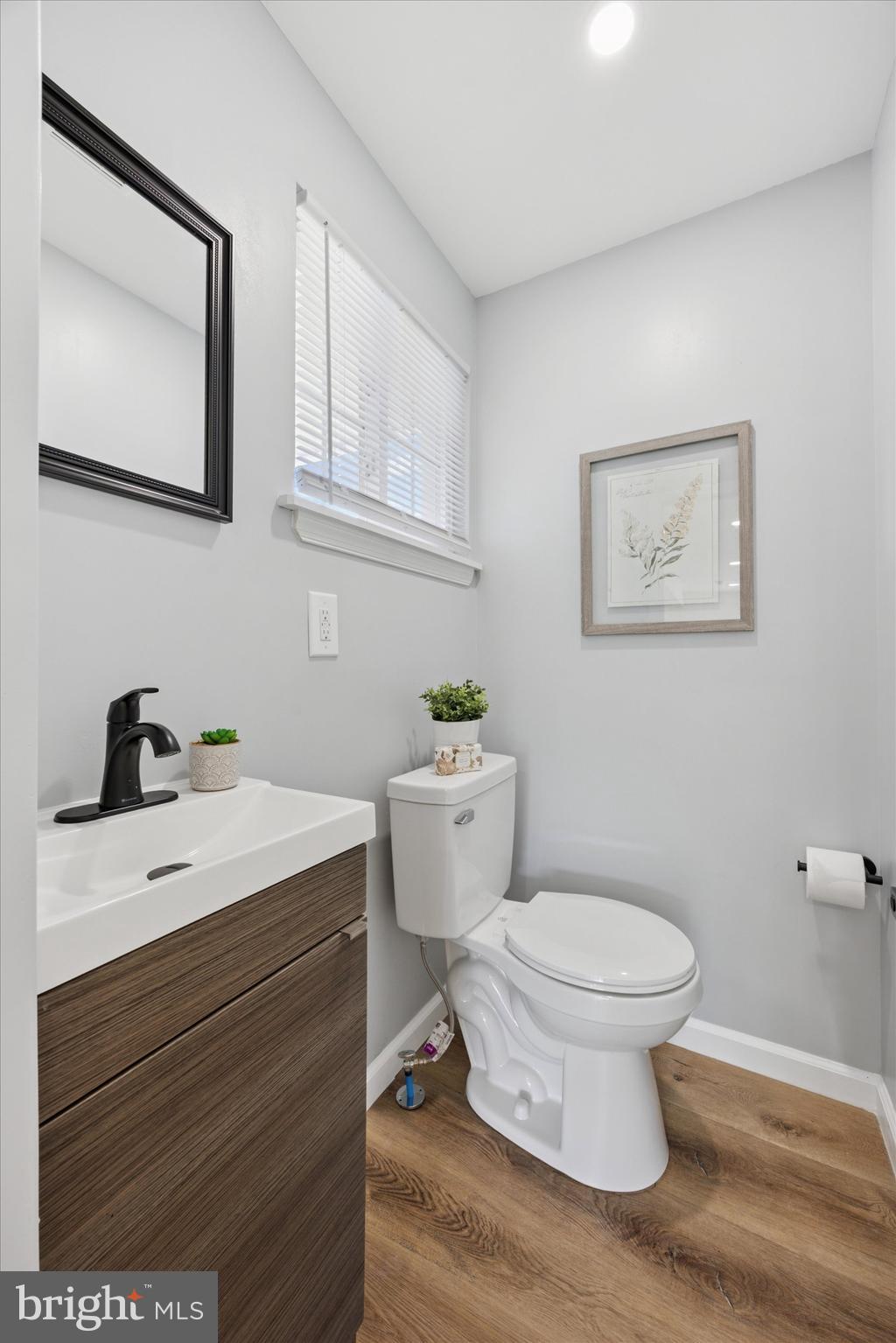 1574 Deer Run Road Warminster, PA 18974 - Photo 21 of 37 a bathroom with a toilet sink and mirror