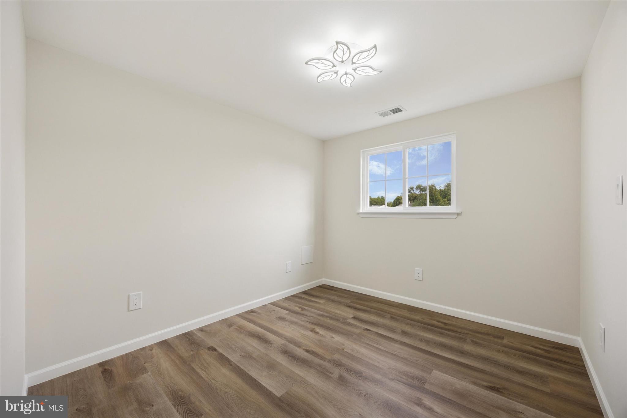 1574 Deer Run Road Warminster, PA 18974 - Photo 29 of 37 a view of an empty room with a window